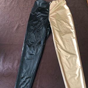 Black and gold patent leather pants